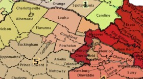 This illustration shows both the current congressional districts and new proposed districts overlaid on a map of the Central Virginia area.