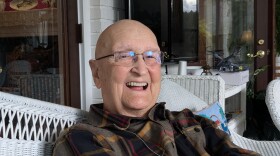 Dave Lang relaxing on the back porch of his Roberts Road home near Centerville.