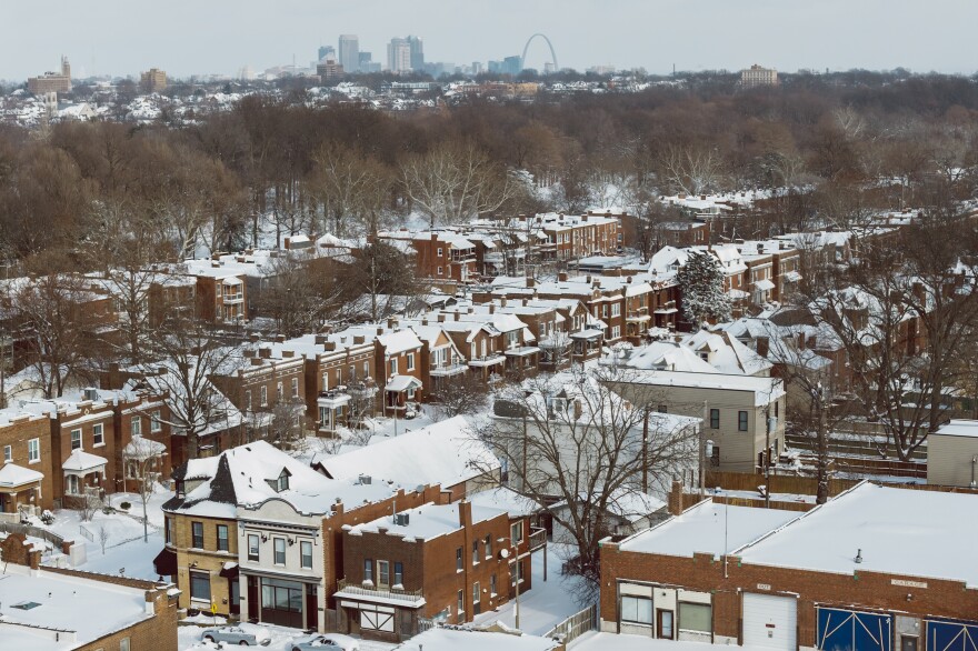 Homes in St. Louis’ Tower Grove South neighborhood are blanketed in snow on Sunday, Jan. 25, 2026.