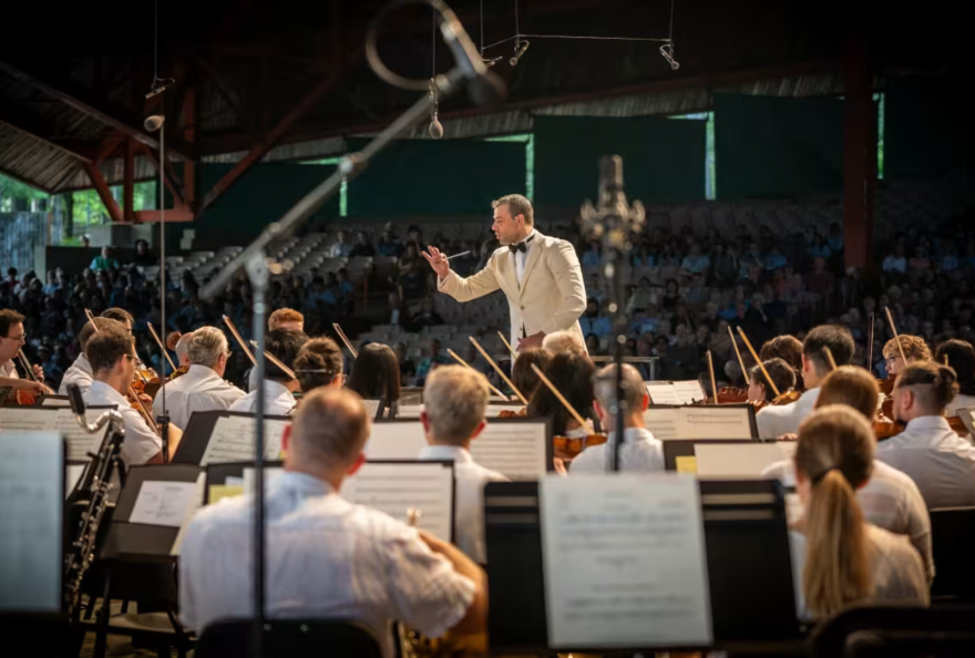 Jader Bignamini leads the Detroit Symphony Orchestra from the stage at Kresge Auditorium at Interlochen.