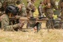 Cpl. Carlos Gonzalez, a machine gunner with the Mexican Naval Infantry marines, fires an M250 light machine gun during a live-fire range as part of Exercise Rim of the Pacific 2026 at Marine Corps Base Kaneohe Bay, Hawaii, June 26, 2026.