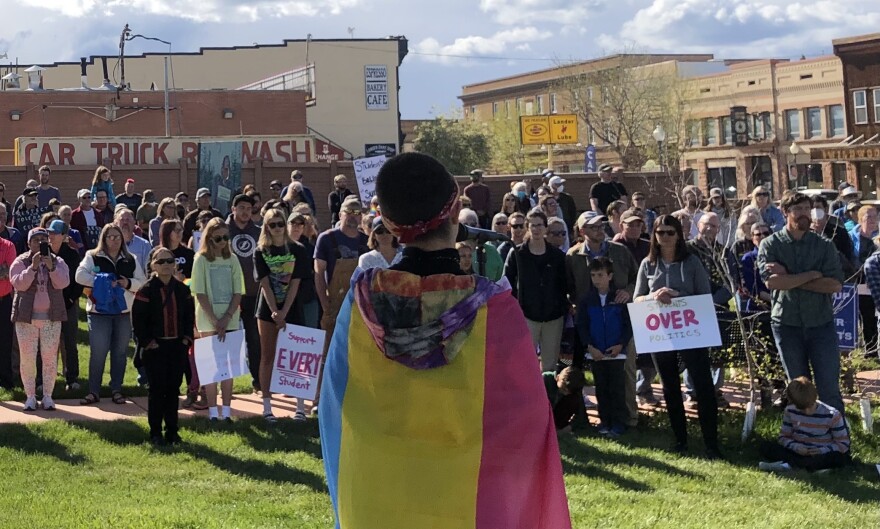 Willow Wells (they/them) addresses a crowd in downtown Lander.