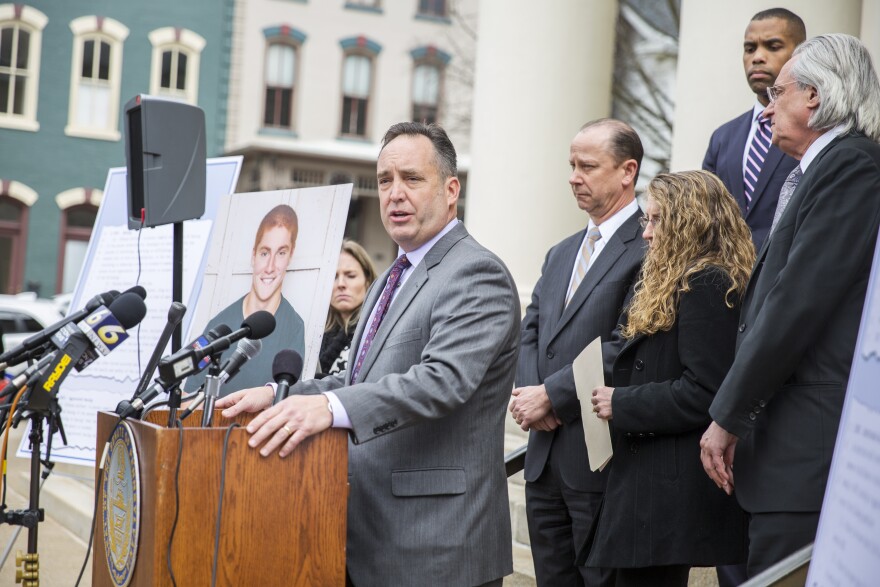 In this file photo from March, Senate Majority Leader Jake Corman released the details of the "Timothy J. Piazza Antihazing Law" with the Piazza family and Penn State president Eric Barron.