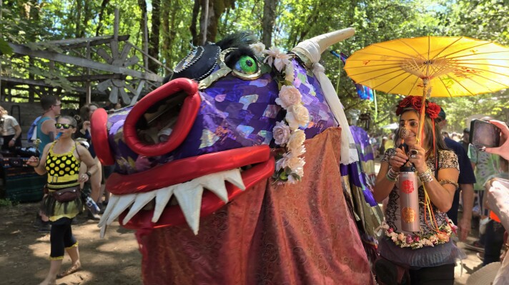 A puppet shaped like a dragon. 