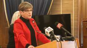 Kansas Democratic Gov. Laura Kelly speaks at a press conference in this Kansas News Service file photo. On Friday, she vetoed a Republican-sponsored tax plan that included a flat income tax rate.