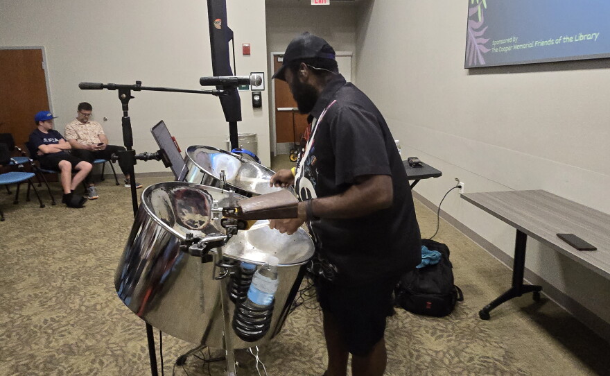 Ravon "Steely" Rhoden plays the steel pan drums at the Cooper Memorial Library in Clermont on Tuesday, October 6, 2026.