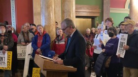 Former Gov. Marc Racicot speaks at a rally in the Capitol Rotunda, on Feb. 1, 2023. Rallygoers spoke out against the unprecedented number of constitutional amendments drafted by Republican legislators this session.