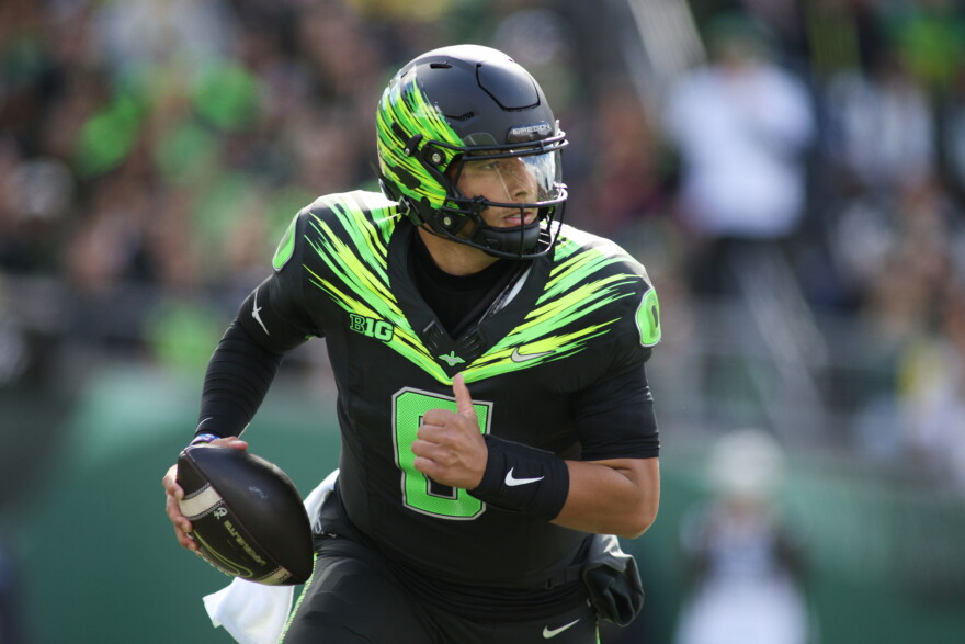 Oregon quarterback Dylan Raiola (8) runs the ball during the first half of an NCAA college football game against UCLA, Saturday, Oct. 10, 2026, in Eugene, Ore.