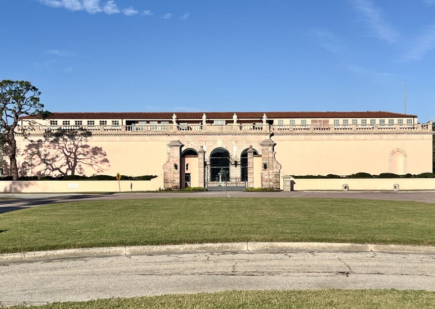 Wide shot of the exterior of a brown museum building