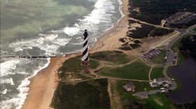 FILE - The Cape Hatteras lighthouse stands, Aug. 29, 1995 on the Outer Banks of North Carolina.