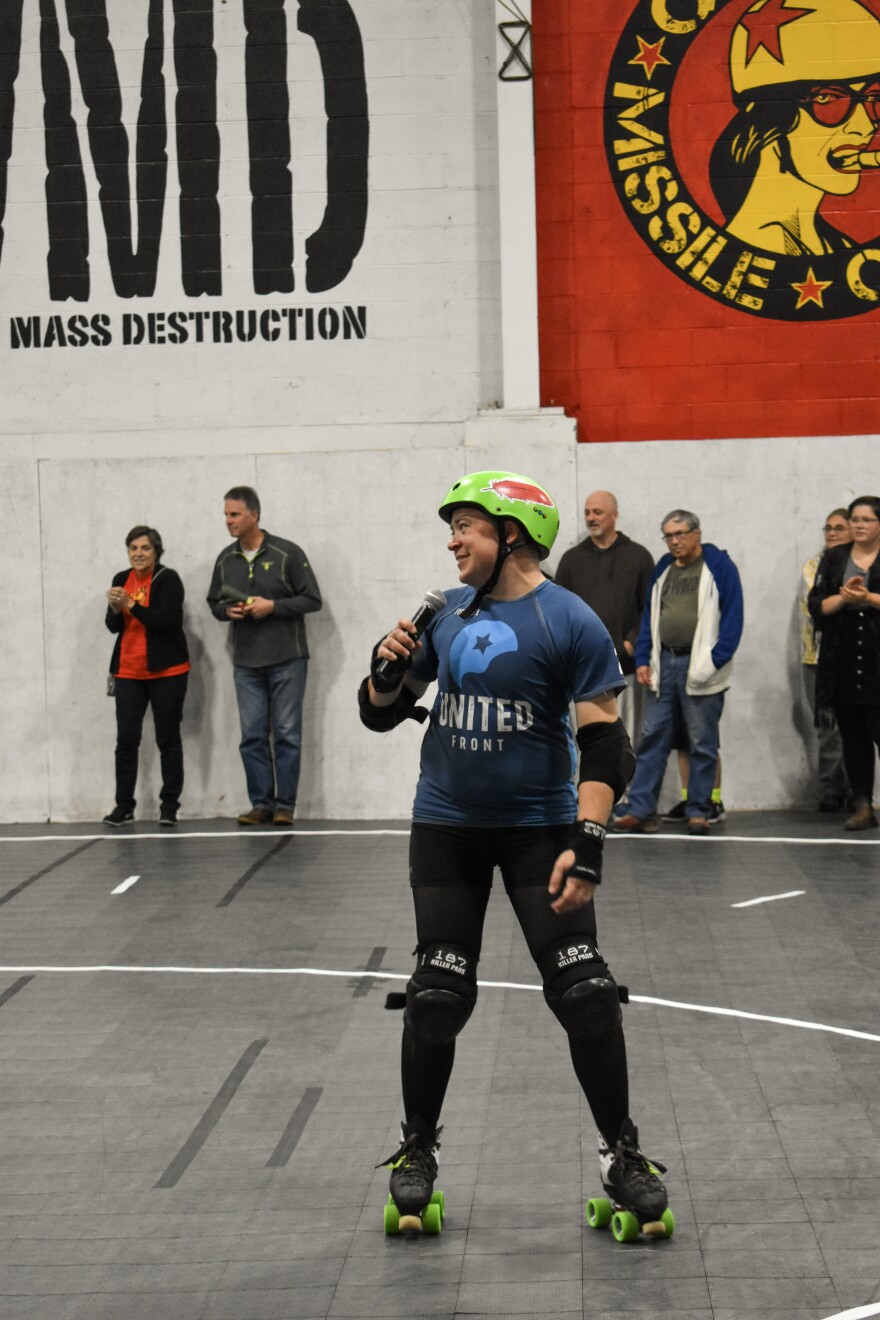 Pioneer Valley Roller Derby board co-chair Alex Kapitan (aka Peter Pandemonium) speaks to the crowd on Sept. 14, 2019, at The Bunker.