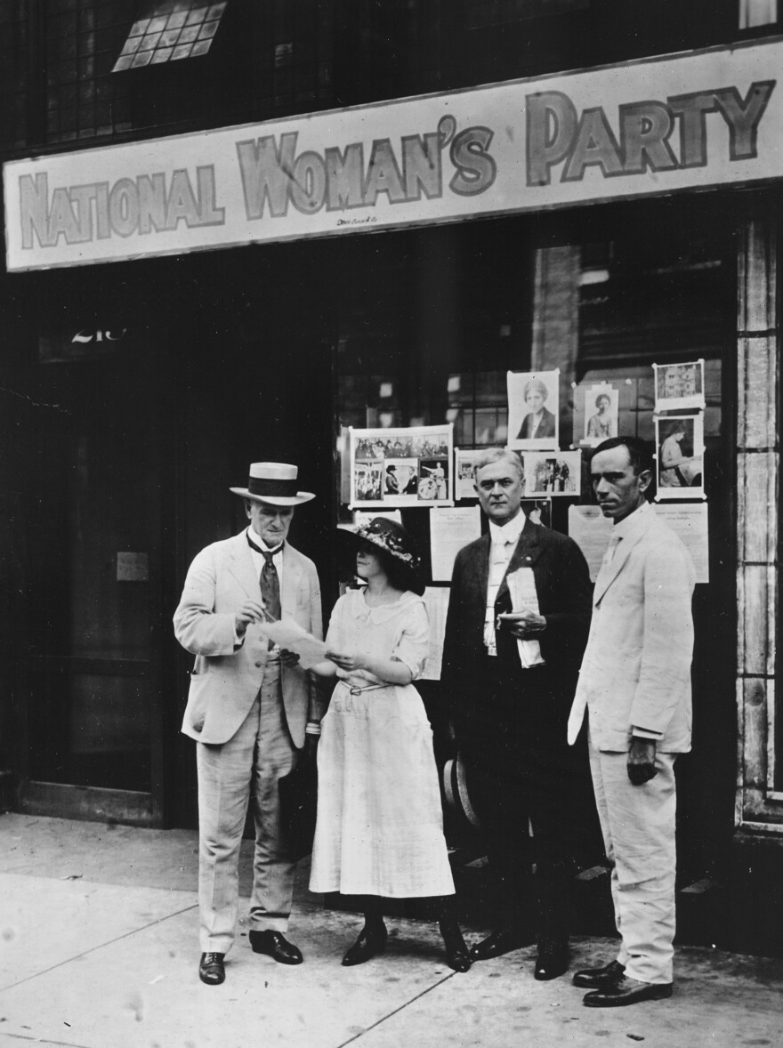 Anita Pollitzer, legislative secretary of the National Woman's Party, meets with Tennessee Sen. John C. Houk (left), Knoxville Mayor E.W. Neal and state Rep. R.I. Johnson — who were suffrage supporters — in front of the Nashville headquarters in August 1920.