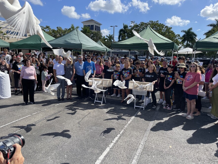 Victim family members released doves at Eagles' Haven in a symbolic tribute to their loved ones.