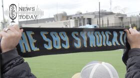 A member of the 509 Syndicate, Spokane's official soccer fan club, holds up a club scarf at the Spokane Zephyr's last game on May 16, 2026.