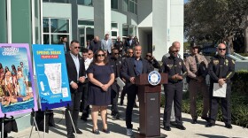Miami Beach Mayor Steven Meiner stands at the podium of a press conference on spring break restrictions at the Miami Beach Police Headquarters on Tues. Feb. 11, 2024.