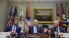President Joe Biden speaks during a briefing on the government's response to Hurricane Helene in the Roosevelt Room of the White House in Washington, Tuesday, Oct. 1, 2024, as Secretary of Transportation Pete Buttigieg, left, and Secretary of Homeland Security Alejandro Mayorkas, right, look on.