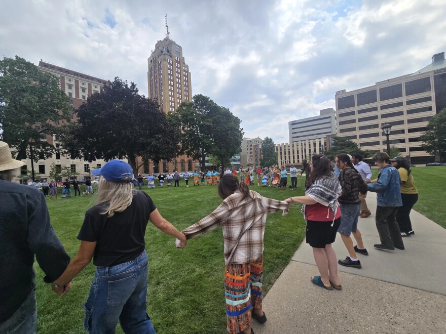 Activists, including tribal community members, opposed to the operation of the Line 5 oil and natural gas liquids pipeline, rally at the Michigan Capitol on Wednesday, August 27.