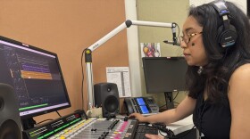 Elayna Cunningham, a college student interning at Koahnic Broadcast Corp., records a program on July 10, 2025, at the Anchorage, Alaska, studios of KNBA, the flagship station for National Native News. (AP Photo/Mark Thiessen)