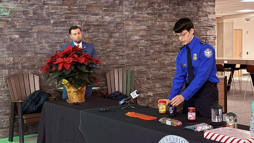 TSA officers show what can and cannot be brought on a flight in a carry-on bag