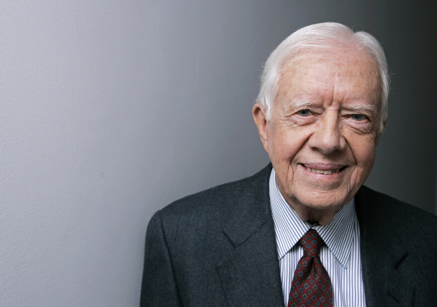 FILE - Former President Jimmy Carter poses for a portrait during the Toronto International Film Festival, Sept. 10, 2007, in Toronto. (AP Photo/Carolyn Kaster, File)