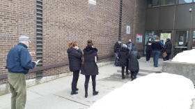 People lined up outside a COVID-19 vaccination center at the sports complex in Hawkesbury, ON on Friday. JAMES MORGAN