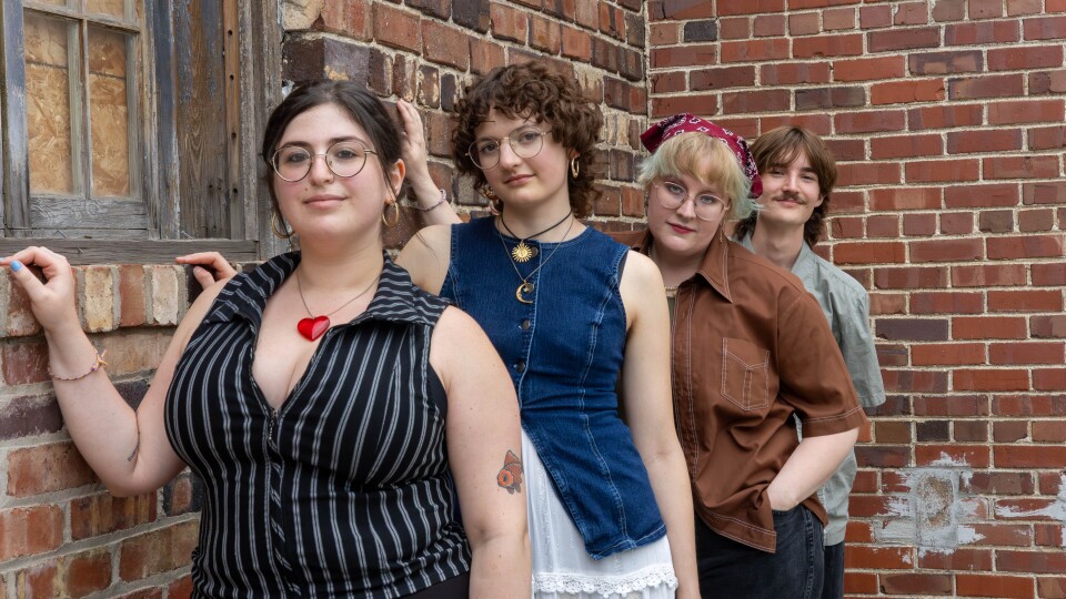 a group of people posing for a photo