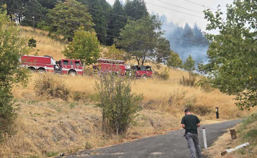 Fire trucks near smoke on Skinner Butte 
