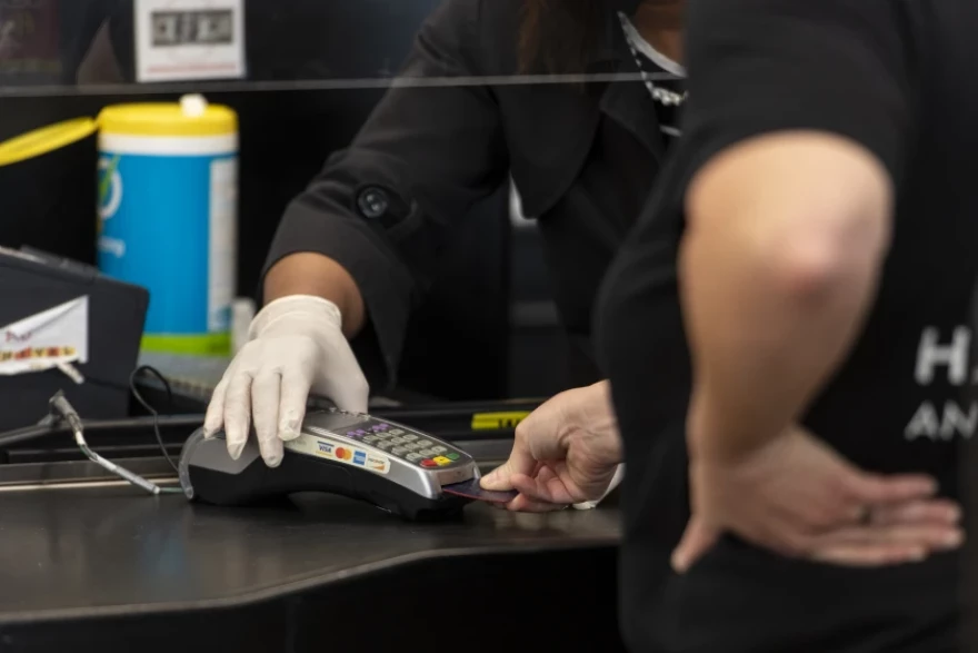 A new state law to end credit card fees on sales tax and tips that businesses pay has been delayed by Illinois lawmakers.