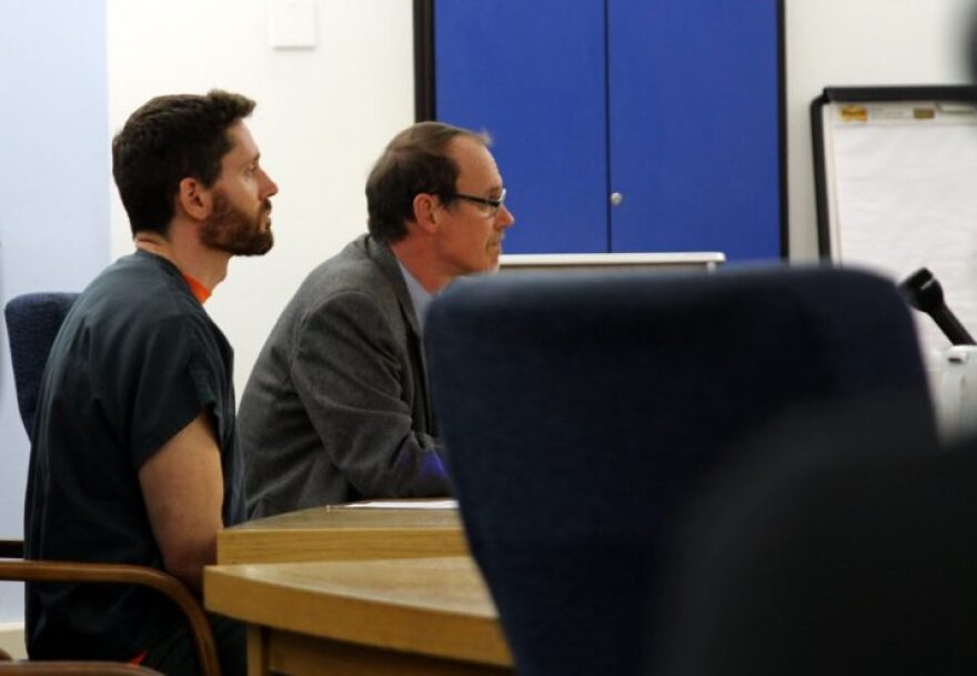 Defendant Reuben Yerkes (l.) sits by then-public defender Jude Pate in Sitka Superior Court in May of 2017, shortly after confessing to killing his girlfriend of two months, Ali Clayton. Yerkes subsequently was transferred to the Lemon Creek Correctional Center in Juneau, where he has remained for the past 13 months. Yerkes will appear in person in Sitka Court on September 4 for sentencing. He’s accepted a plea deal and a sentence of 45 years, with a discretionary parole review after 15 years. (KCAW photo/Robert Woolsey)