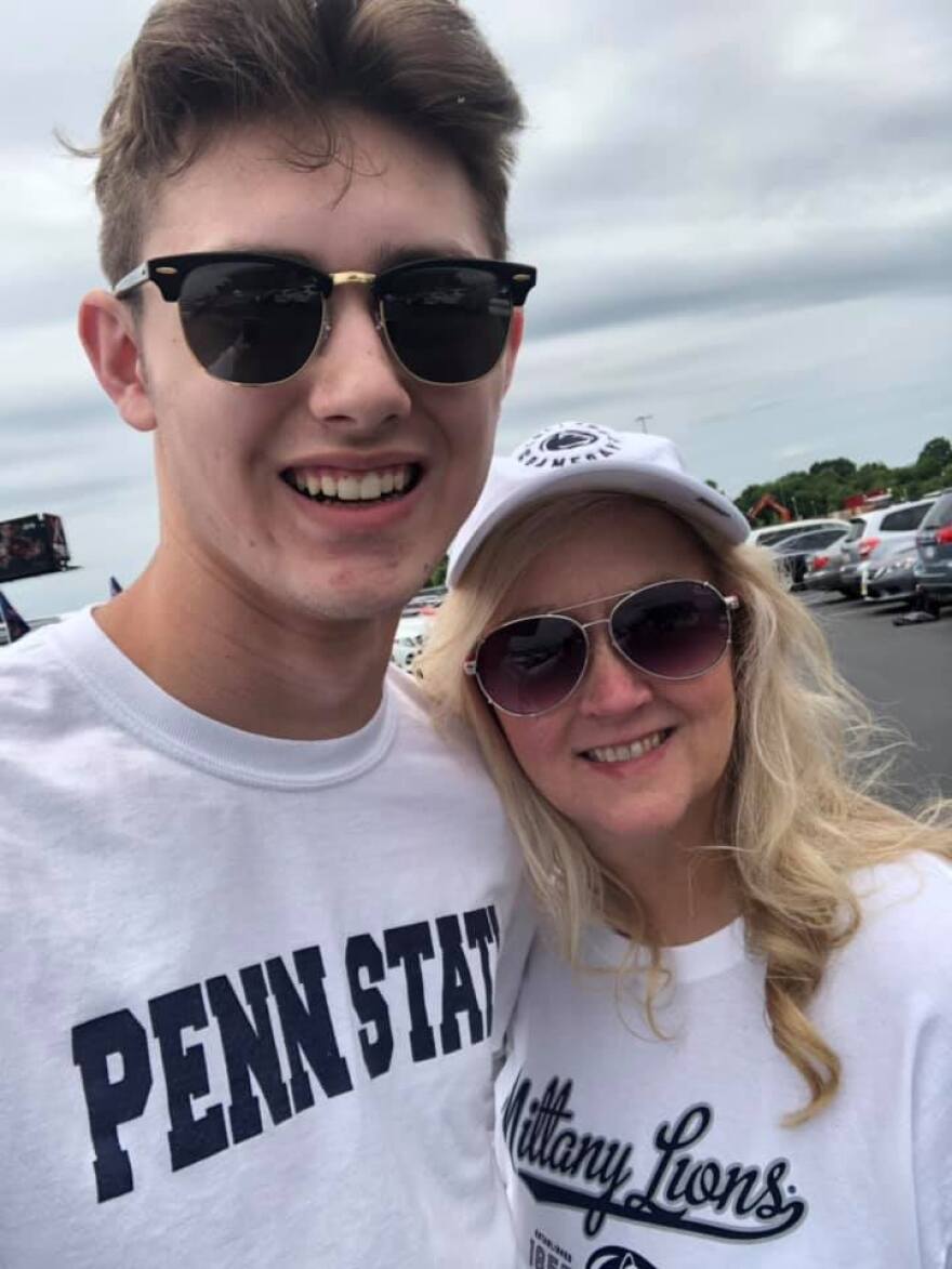 Bryan Peasley and his mom, Debbie at a Penn State football game.