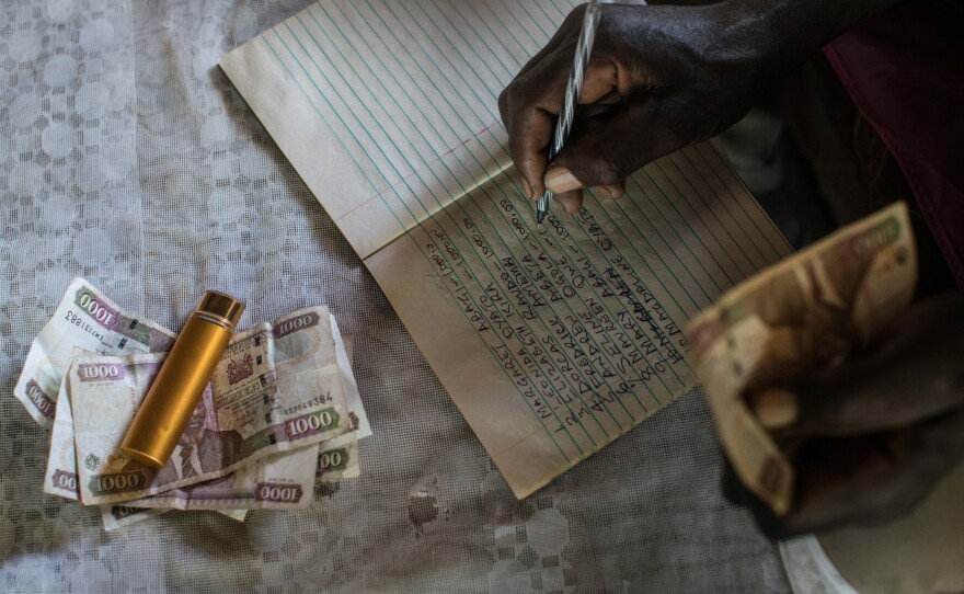 The club treasurer carefully tracks each member's monthly contribution. The success of the clubs belies the stereotype that poor people don't have enough discipline or experience with large sums of money to manage cash aid wisely.