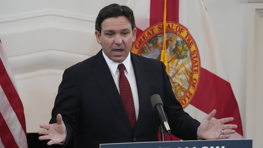 Florida Gov. Ron DeSantis speaks Monday in Miami Beach, Fla. backing legislation that would ban homeless camps on public property except for designated areas.