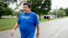 Gov. J.B. Pritzker walks along 31st Street Beach on the South Side Sept. 16.