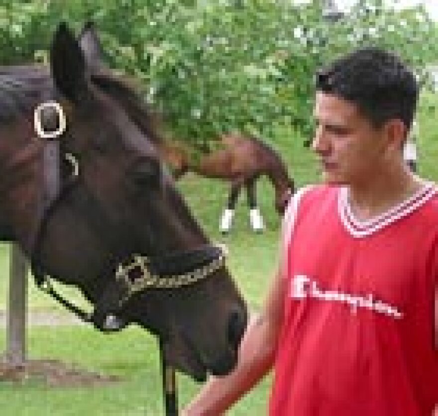 Carlos Goadiana, a horse groom from Texas.