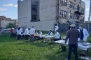 Students at the Medical College of Wisconsin host an outdoor health clinic during the coronavirus pandemic in 2021. Now, there's another outbreak in the state for which a vaccine already exists.