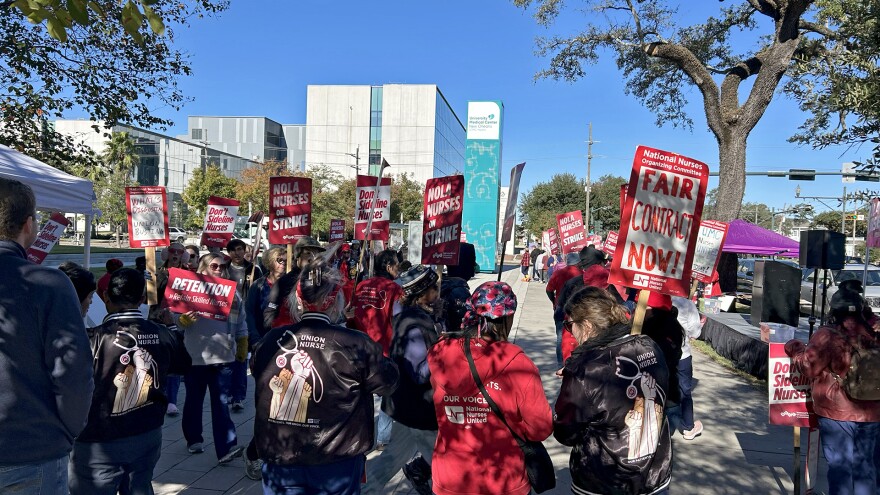 Striking nurses march outside UMC in New Orleans on Tuesday, November 11, 2025. The nurses are striking for three days to call attention to their efforts to negotiate staff contracts with hospital administrators that include increases in pay and benefits in order to improve staff retention.