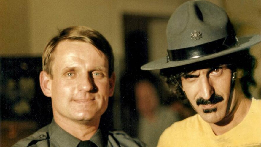 Zappa in 1981 with Pennsylvania state trooper Chuck Ash, who interviewed the musician during an anti-drug campaign run by the Montgomery County school district.