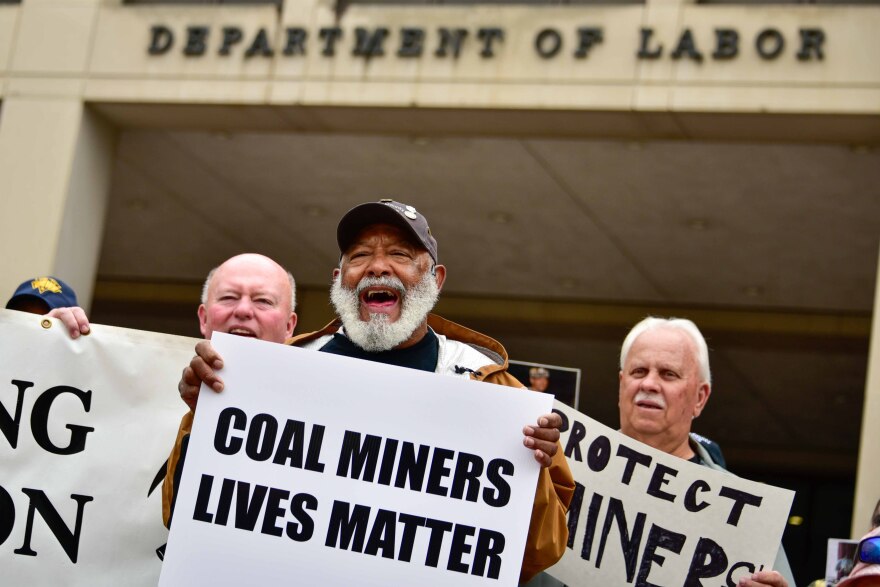 Gary Hairston, President of the National Black Lung Association, holds a "Coal Miners Lives Matter" matter at a rally in front of the Department of Labor in Washington D.C. on Tuesday, Oct. 14, 2025.