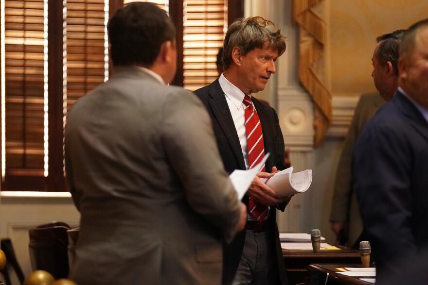 Senate Judiciary Committee Chairman Luke Rankin speaks with Florence Republican Rep. Jay Jordan in the House Chamber on Feb. 4, 2025.