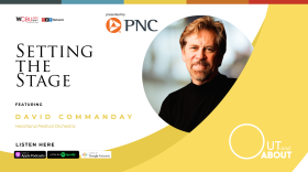 The image features a photo of this episode’s guest: David Commanday, Artistic Director and Conductor of the Heartland Festival Orchestra. The image features an all-capitalized text headline that reads “SETTING THE STAGE” with an underlying smaller text that reads “featuring David Commanday, Heartland Festival Orchestra.” The graphic artwork also features an icon of the podcast’s sponsor PNC Bank in the center with the WCBU and NPR logos in the left-hand corner. In the bottom right-hand corner are icons of the various podcast platforms where the Out and About podcast can be streamed/downloaded. In the bottom left-hand corner is Out and About spelled out in large, white graphic letters. 