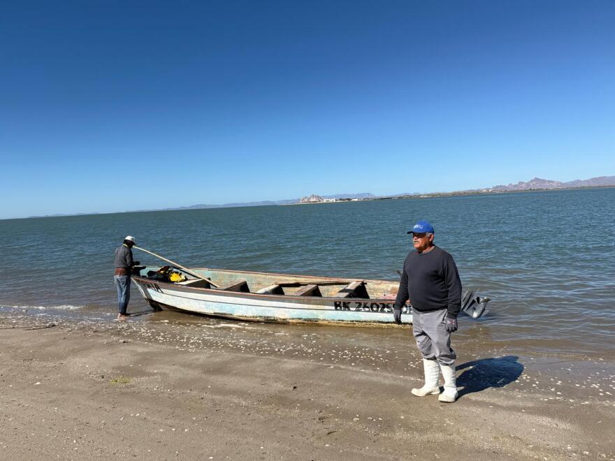 Fishermen help with a cleanup of the estuary south of Bahía de Kino.
