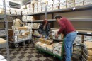 Gallatin County elections staff load absentee ballots to be mailed