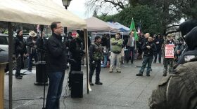 Washington state Rep. Representative Matt Shea, R-Spokane, speaks at the ''Rally 4 UR Rights'' gun rights rally in front of the state Capitol steps in 2018. CREDIT: ENRIQUE PEREZ DE LA ROSA / NORTHWEST NEWS NETWORK