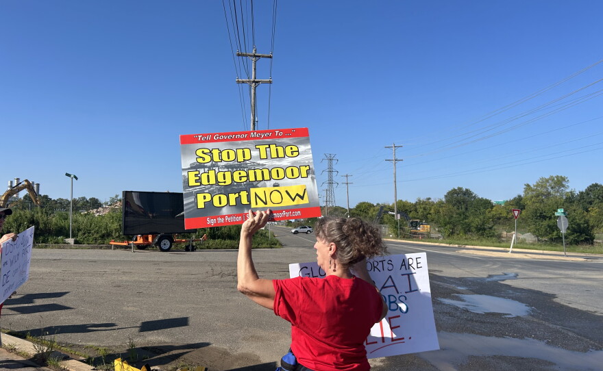 Barbara Boese protests outside the former DuPont Industrial site in Edgemoor.