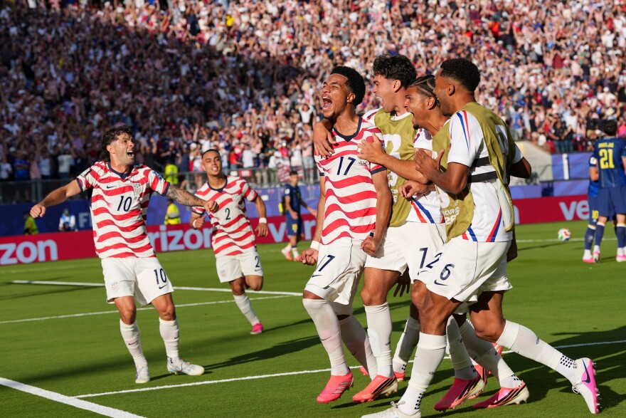 United States' Malik Tillman (17) celebrates with teammates after scoring on a free kick during the World Cup round of 32 soccer match between the United States and Bosnia in Santa Clara, Calif., near San Francisco, Wednesday, July 1, 2026. The United States advanced and will play Belgium on July 6 in Seattle.