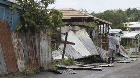 A man surveys the wreckage on his property after the passing of Hurricane Irma, in St. John's, Antigua and Barbuda, Wednesday, Sept. 6, 2017. Heavy rain and 185-mph winds lashed the Virgin Islands and Puerto Rico's northeast coast as Irma, the strongest Atlantic Ocean hurricane ever measured, roared through Caribbean islands on its way to a possible hit on South Florida. (Johnny Jno-Baptiste/AP)