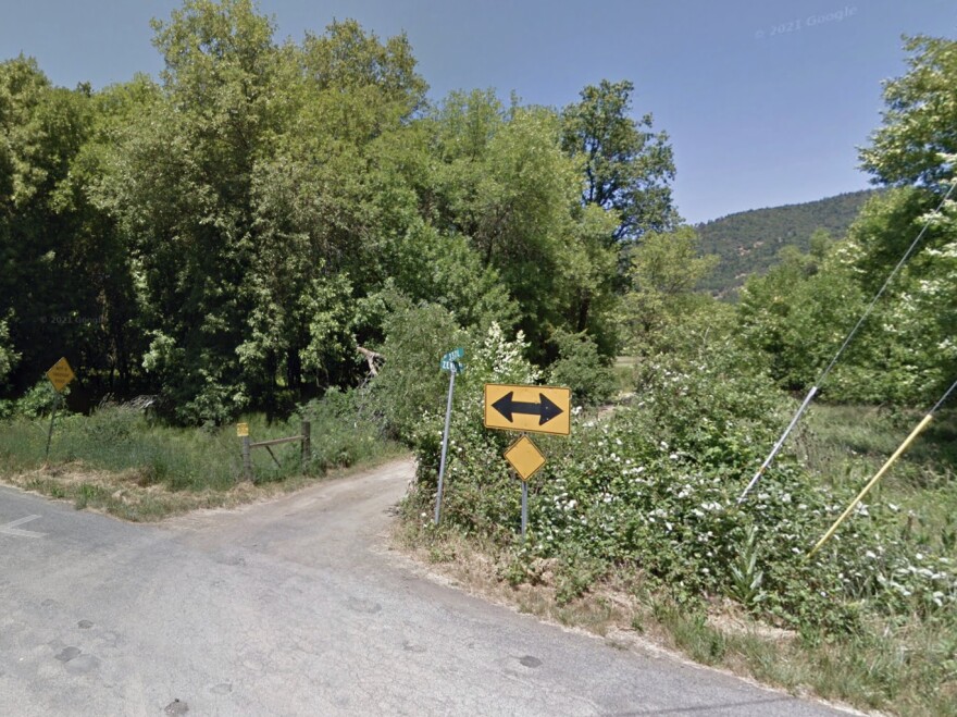 A shot of a country road in Covelo featuring a road sign for county road 337