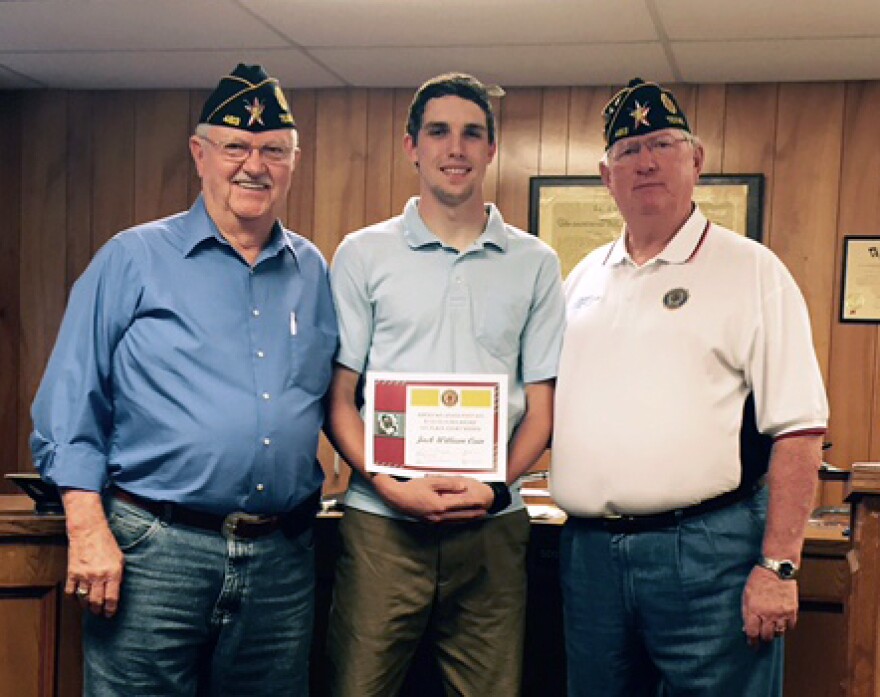 Red Henderson Post 483 Vice Commander Butch Burns and Commander Gary Thompson present Cooper High School senior Jack Cain with his $750 local American Legion scholarship.