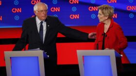 Sen. Bernie Sanders gestures toward Sen. Elizabeth Warren during a Democratic presidential debate on July 30 in Detroit. (Paul Sancya/AP)