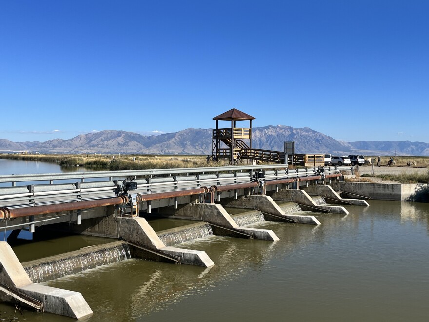 A dam separating the Bear River from the Great Salt Lake.